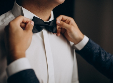 Where should groomsmen choose tailored suits?